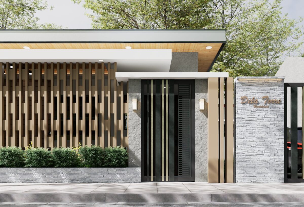 A stylish entrance of a luxury residence characterized by modern vertical slats and lush greenery.